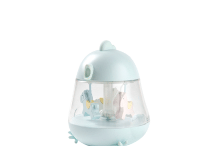 Lampe med en karrusel spilledåse